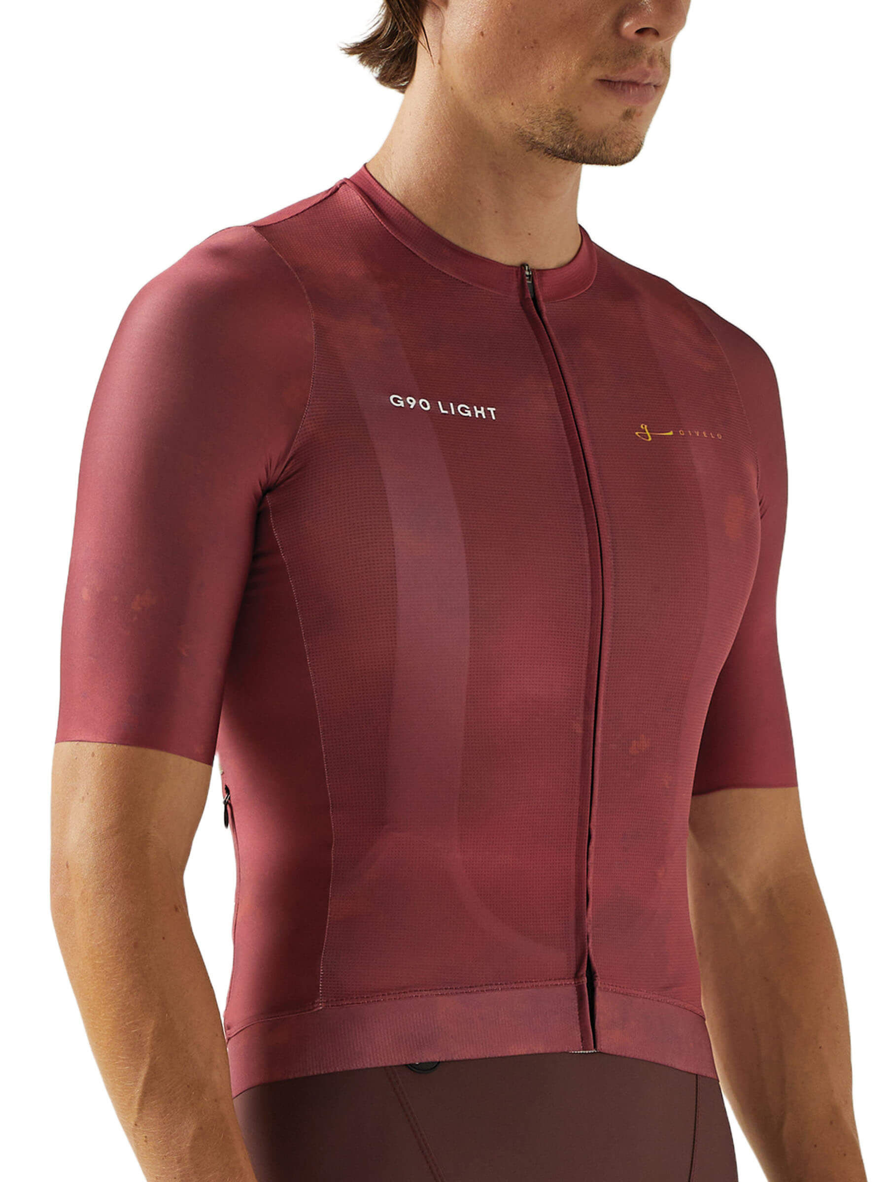 Male cyclist in a garnet Givelo G90 jersey, ideal for both racing and climbing.