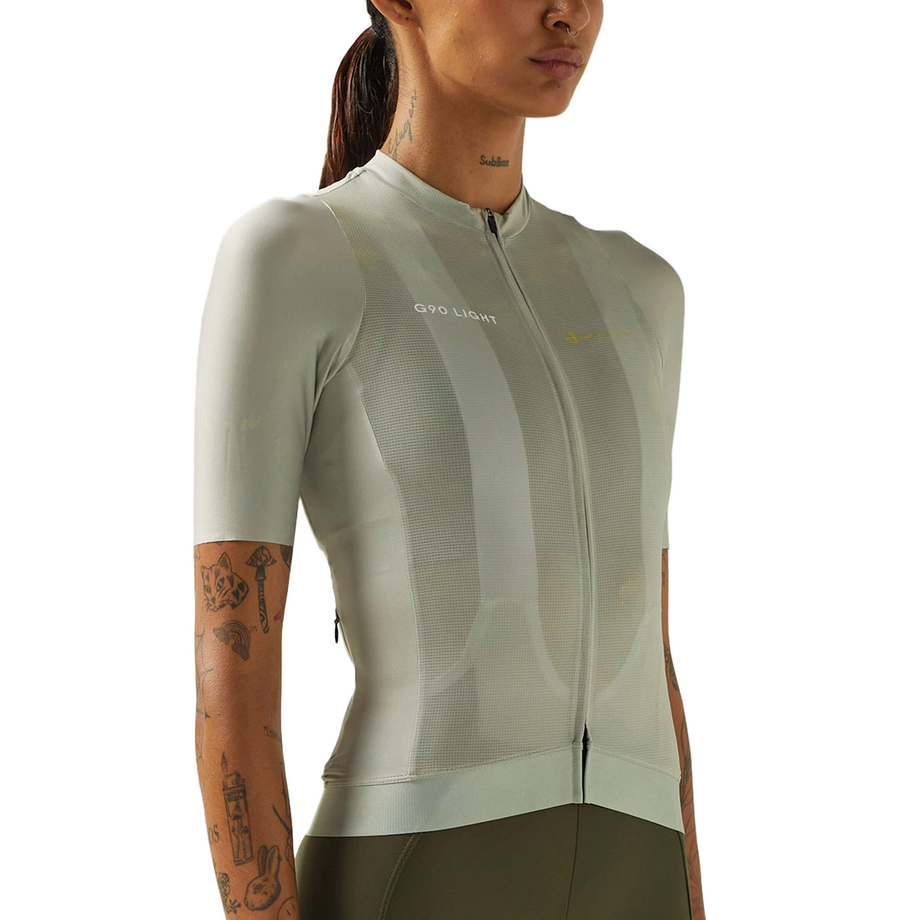 Cyclist in a mint Givelo G90 Light jersey, representing the pinnacle of cycling innovation.