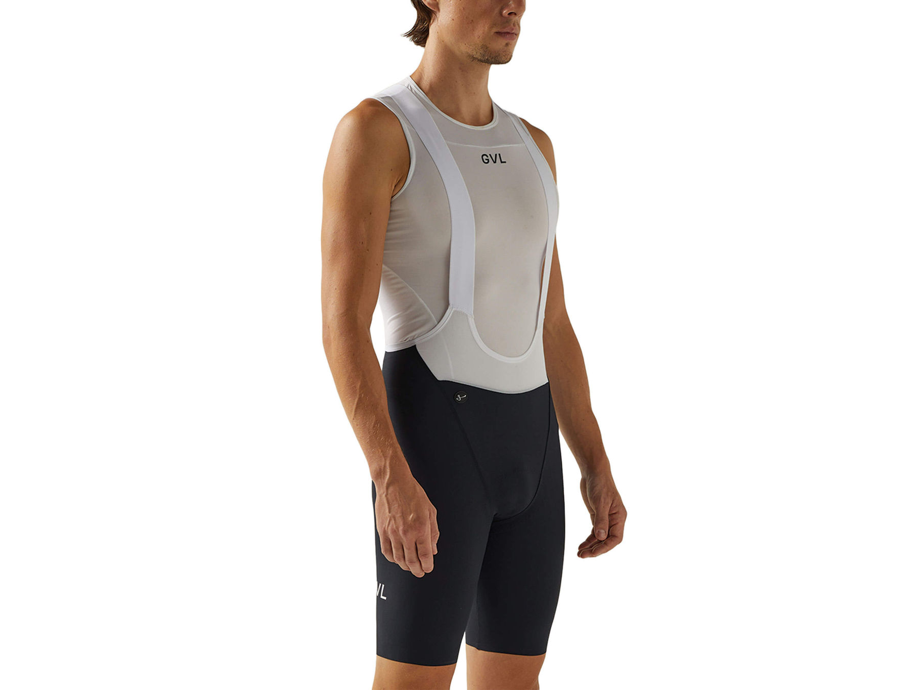 Front view of a man in black Givelo HD Pro Bib Shorts featuring a white 