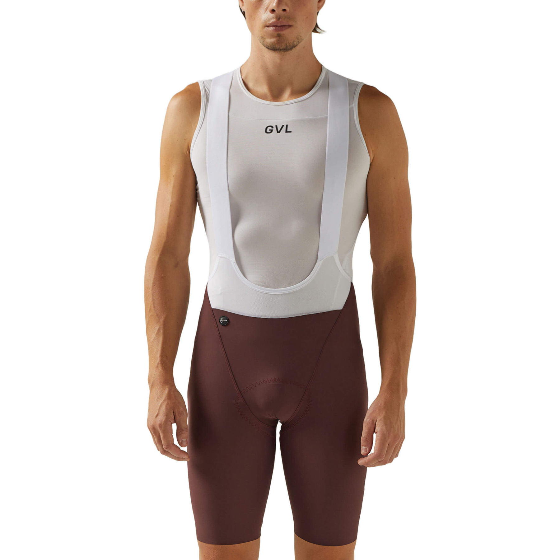 Front view of a man in merlot-colored Givelo HD Pro Bib Shorts paired with a white and grey cycling vest. The shorts boast a precision fit with a seamless construction and a central logo, designed for long-distance cycling.