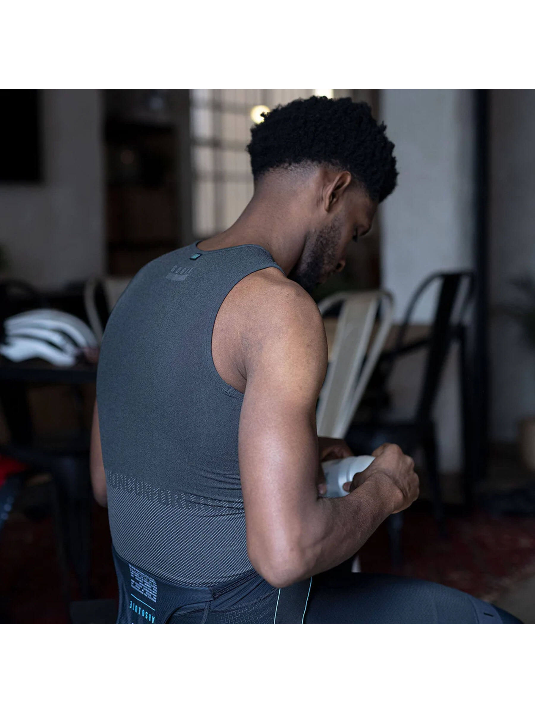 Athlete wearing GOBIK Limber Skin Sleeveless Base Layer, emphasizing the thermal regulation and seamless fit.